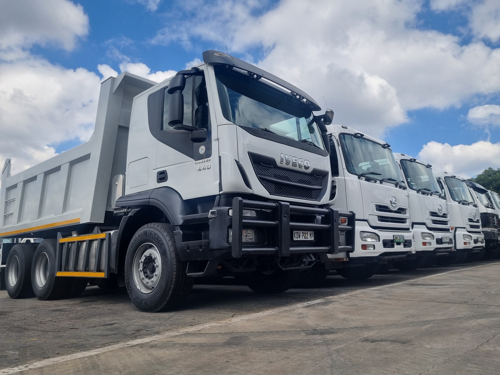 Rigid trucks parked in a row