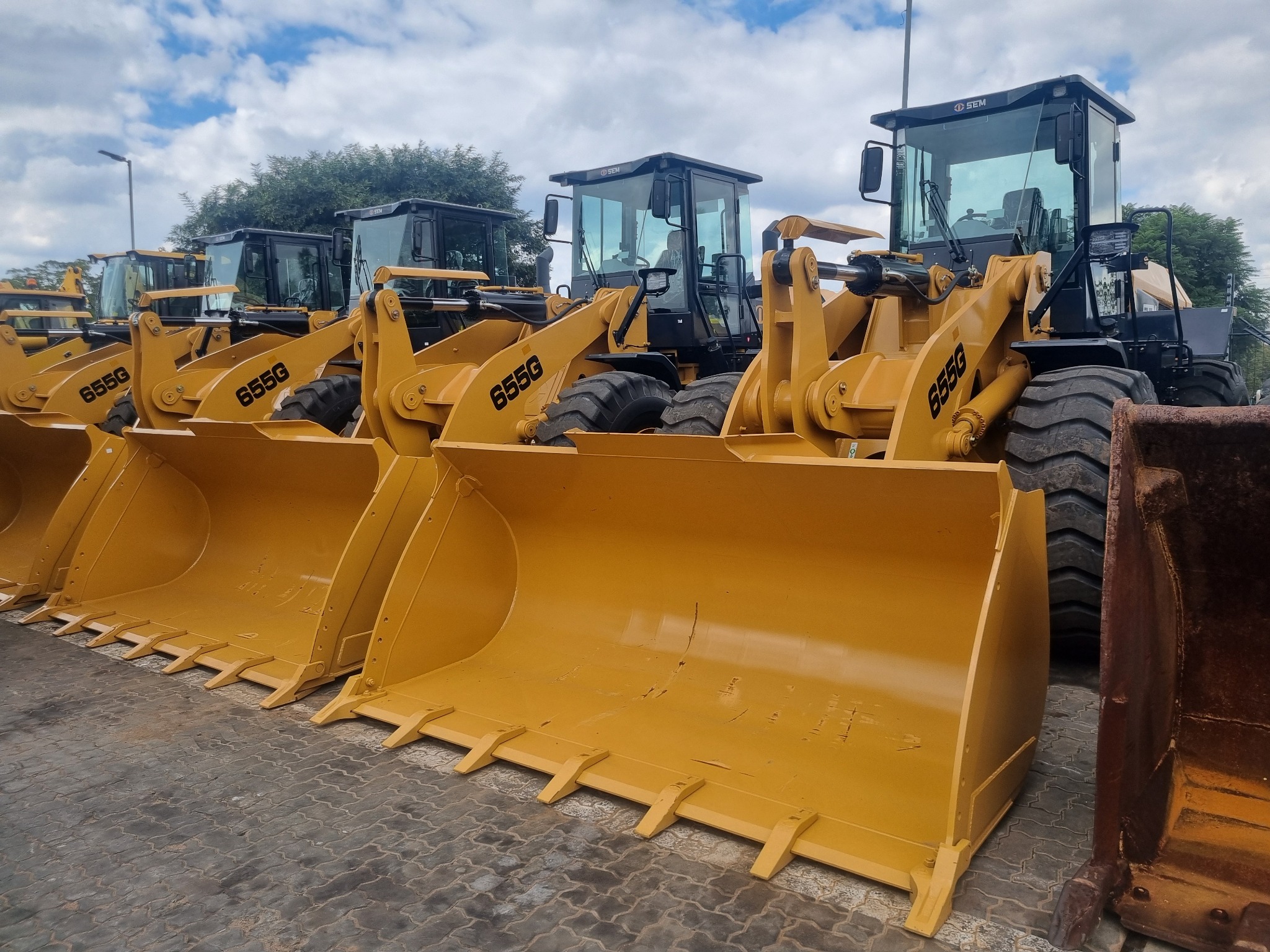 Wheel loaders parked in the WH Auctioneers yard